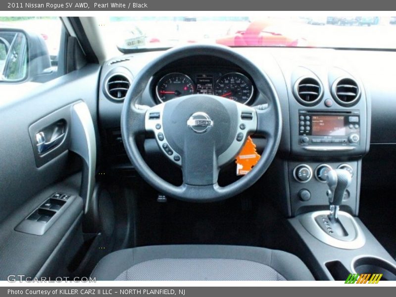 Pearl White / Black 2011 Nissan Rogue SV AWD