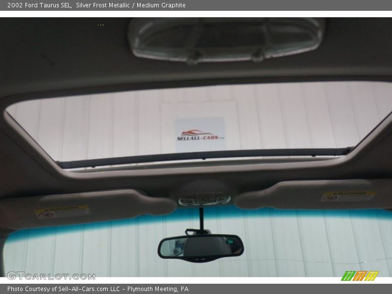 Silver Frost Metallic / Medium Graphite 2002 Ford Taurus SEL