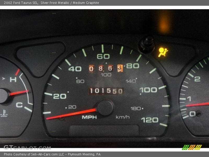 Silver Frost Metallic / Medium Graphite 2002 Ford Taurus SEL