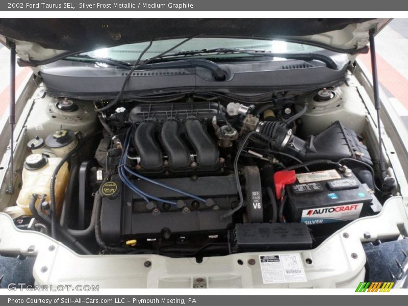 Silver Frost Metallic / Medium Graphite 2002 Ford Taurus SEL