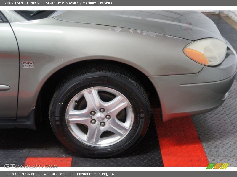 Silver Frost Metallic / Medium Graphite 2002 Ford Taurus SEL