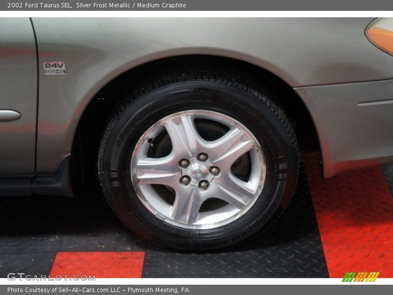 Silver Frost Metallic / Medium Graphite 2002 Ford Taurus SEL