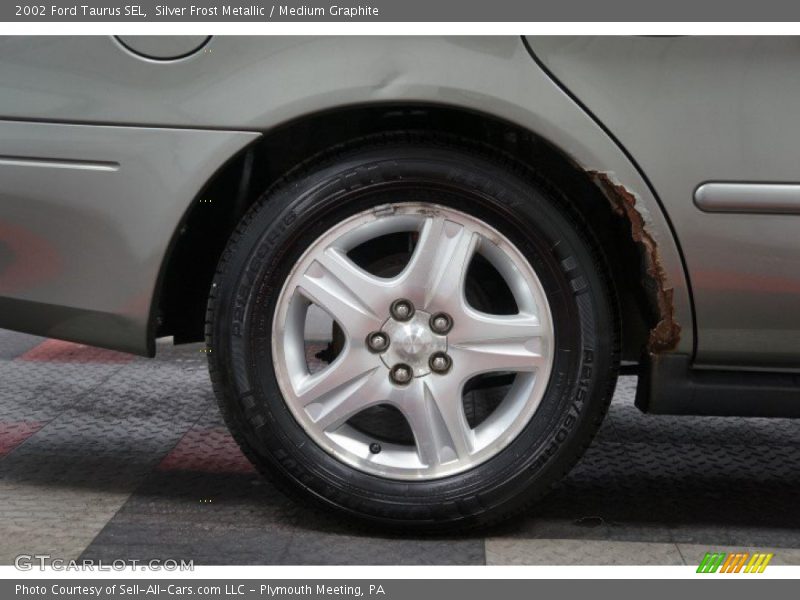 Silver Frost Metallic / Medium Graphite 2002 Ford Taurus SEL