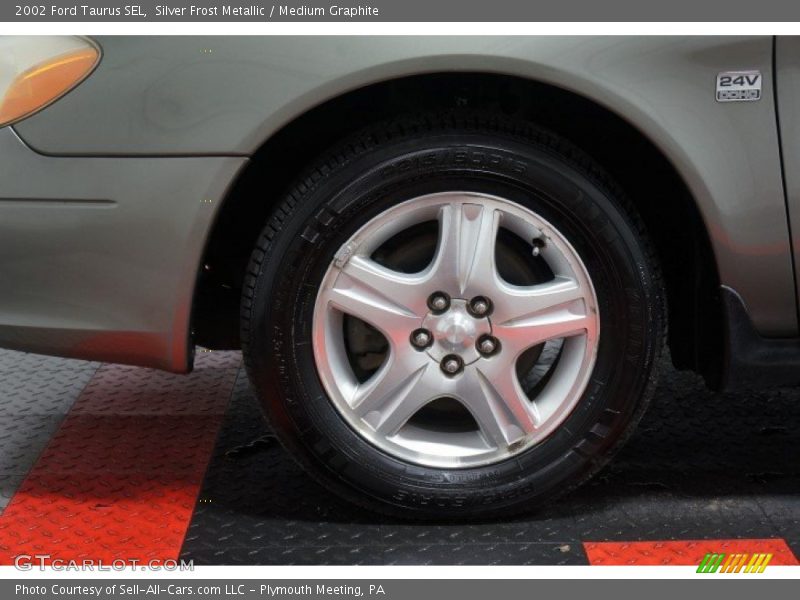 Silver Frost Metallic / Medium Graphite 2002 Ford Taurus SEL