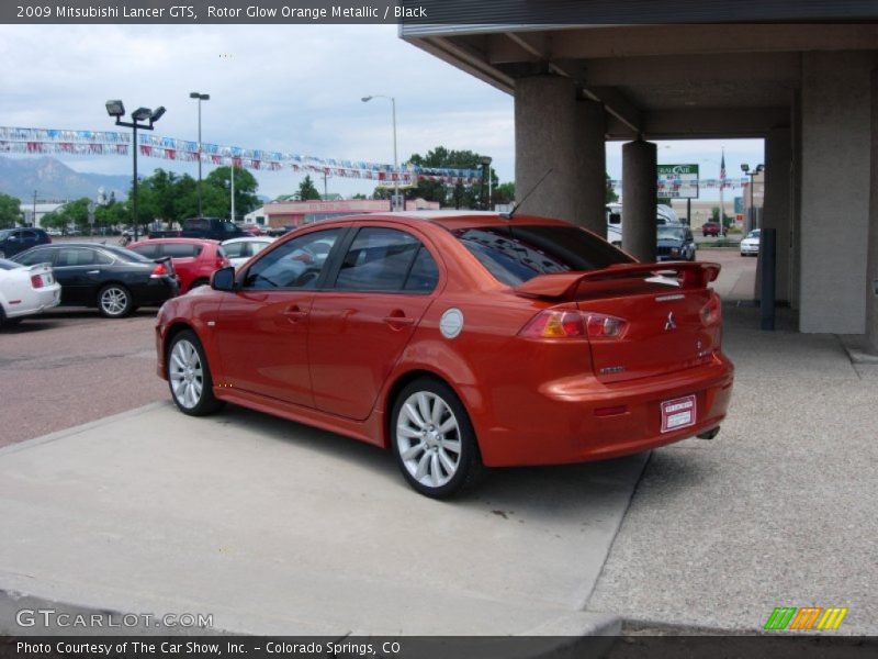 Rotor Glow Orange Metallic / Black 2009 Mitsubishi Lancer GTS