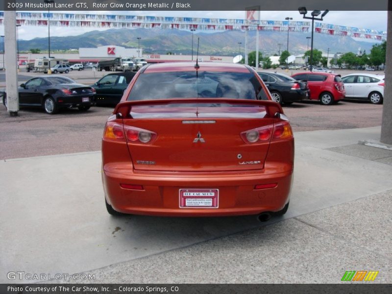Rotor Glow Orange Metallic / Black 2009 Mitsubishi Lancer GTS