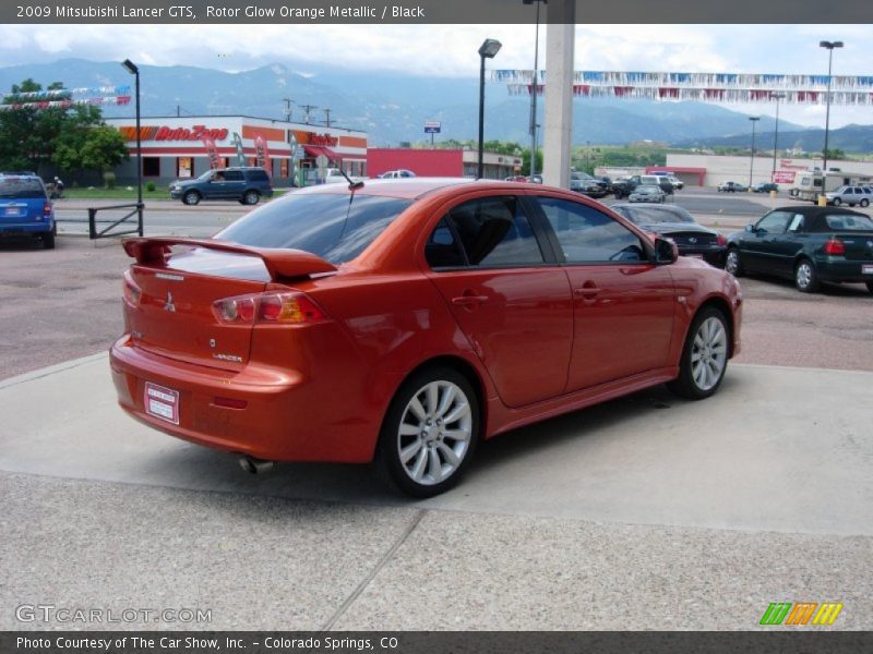 Rotor Glow Orange Metallic / Black 2009 Mitsubishi Lancer GTS