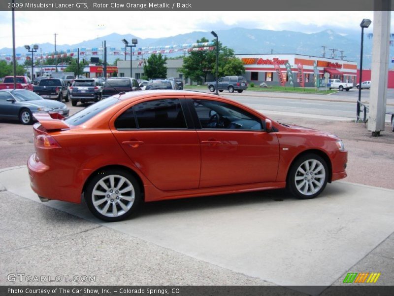Rotor Glow Orange Metallic / Black 2009 Mitsubishi Lancer GTS