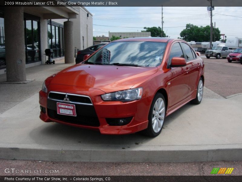 Rotor Glow Orange Metallic / Black 2009 Mitsubishi Lancer GTS