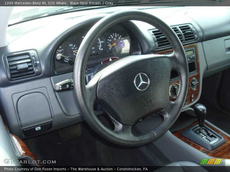 Black Opal Metallic / Grey 1999 Mercedes-Benz ML 320 4Matic