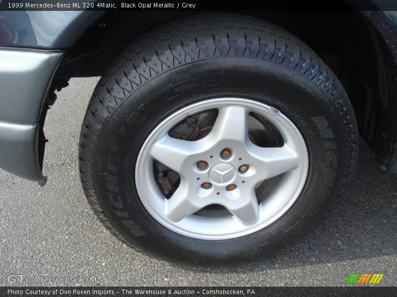Black Opal Metallic / Grey 1999 Mercedes-Benz ML 320 4Matic