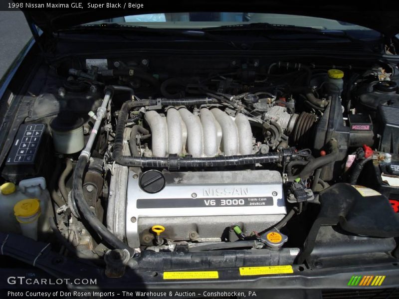 Super Black / Beige 1998 Nissan Maxima GLE