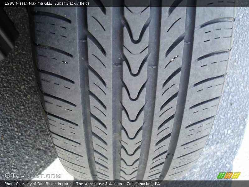 Super Black / Beige 1998 Nissan Maxima GLE
