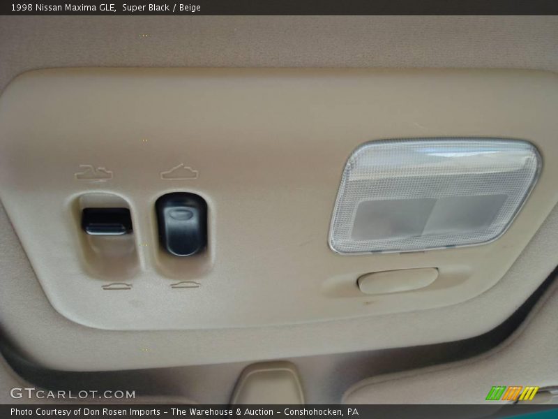 Super Black / Beige 1998 Nissan Maxima GLE