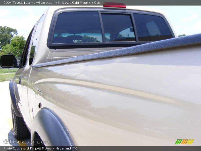 Mystic Gold Metallic / Oak 2004 Toyota Tacoma V6 Xtracab 4x4