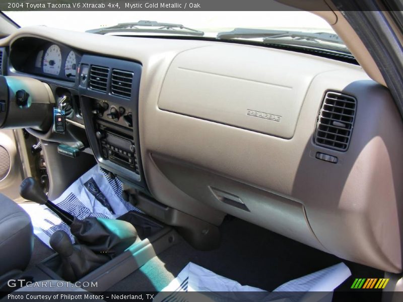 Mystic Gold Metallic / Oak 2004 Toyota Tacoma V6 Xtracab 4x4