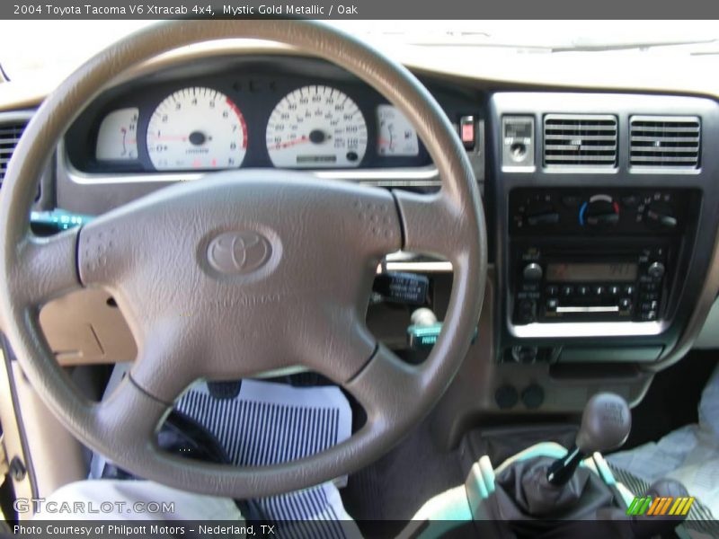 Mystic Gold Metallic / Oak 2004 Toyota Tacoma V6 Xtracab 4x4