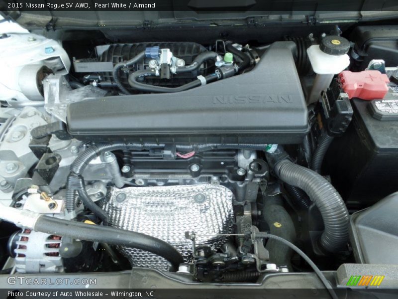 Pearl White / Almond 2015 Nissan Rogue SV AWD
