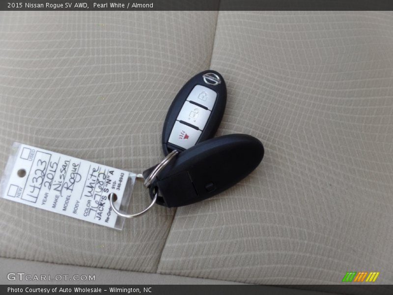 Pearl White / Almond 2015 Nissan Rogue SV AWD