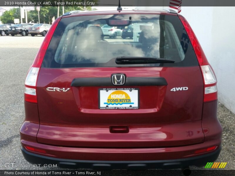 Tango Red Pearl / Gray 2010 Honda CR-V LX AWD