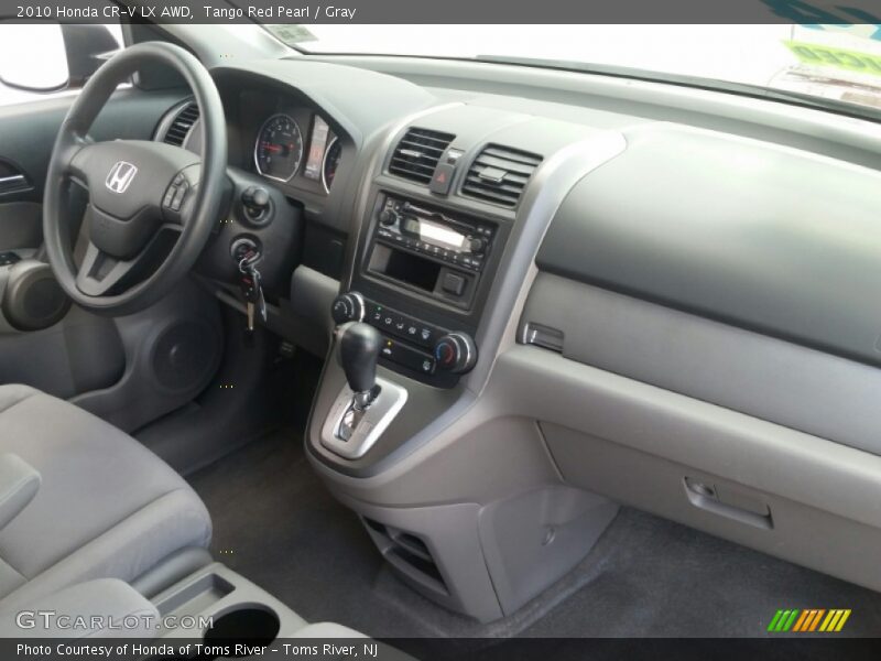 Tango Red Pearl / Gray 2010 Honda CR-V LX AWD
