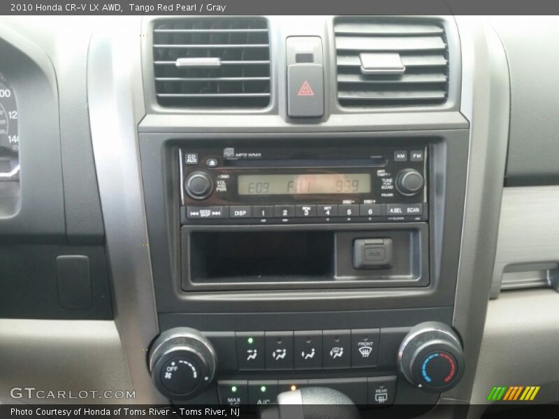 Tango Red Pearl / Gray 2010 Honda CR-V LX AWD