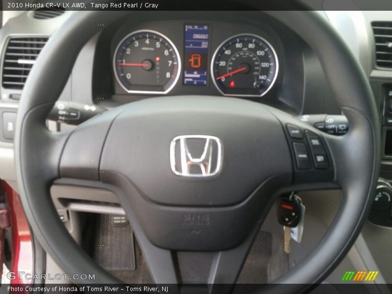 Tango Red Pearl / Gray 2010 Honda CR-V LX AWD