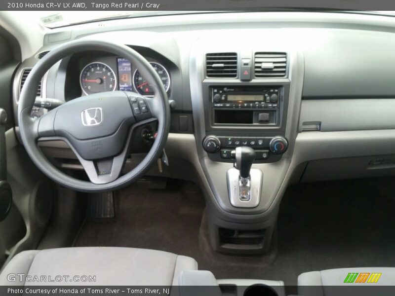 Tango Red Pearl / Gray 2010 Honda CR-V LX AWD