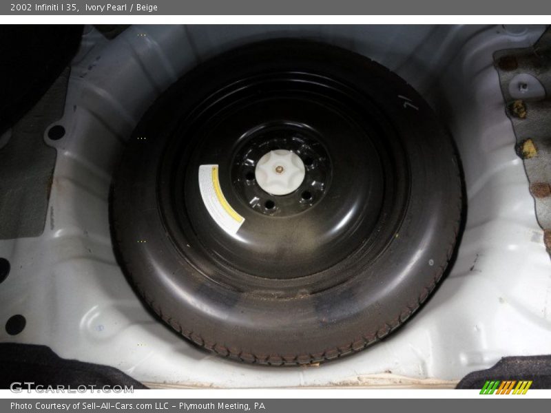 Ivory Pearl / Beige 2002 Infiniti I 35