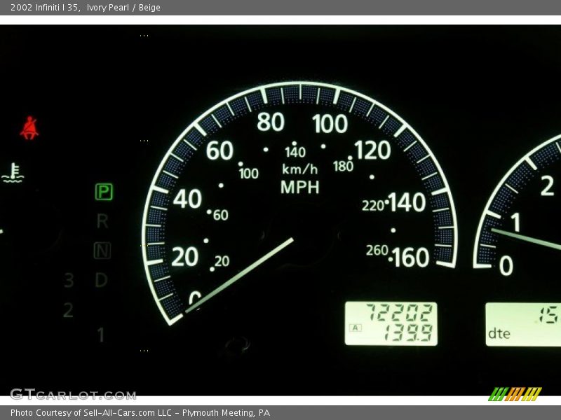 Ivory Pearl / Beige 2002 Infiniti I 35