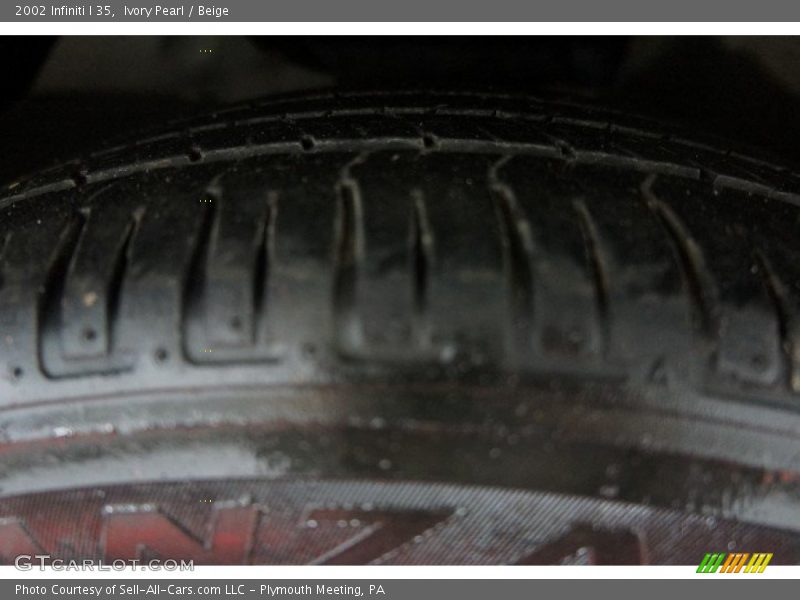 Ivory Pearl / Beige 2002 Infiniti I 35