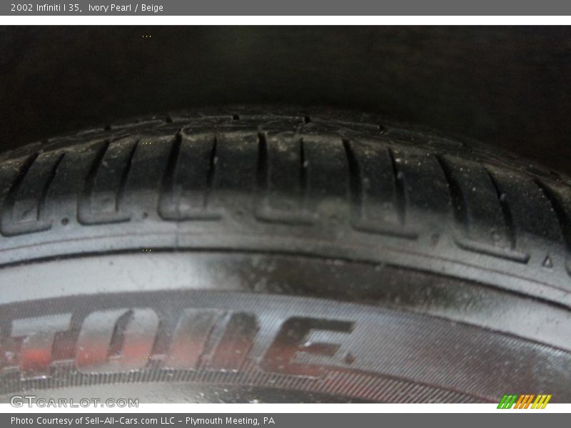 Ivory Pearl / Beige 2002 Infiniti I 35