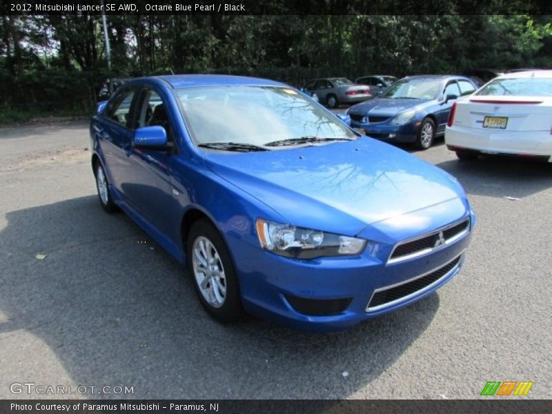 Octane Blue Pearl / Black 2012 Mitsubishi Lancer SE AWD