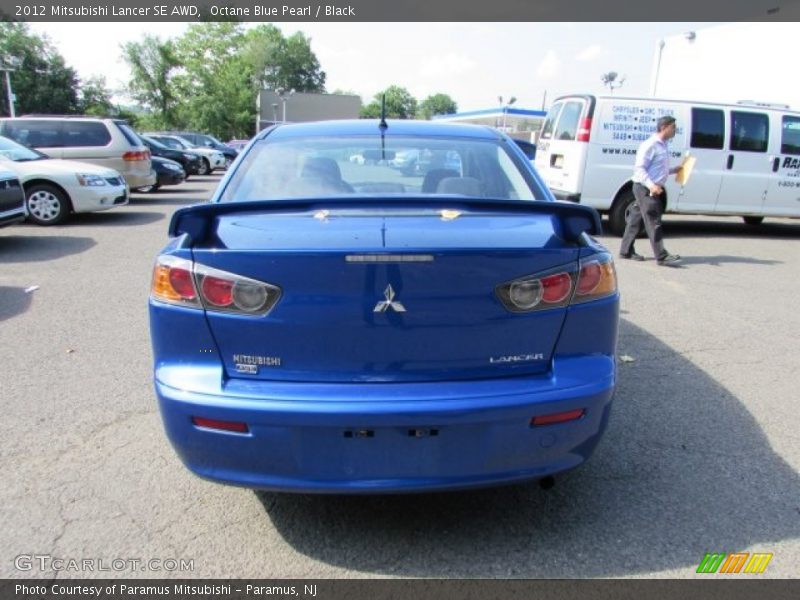 Octane Blue Pearl / Black 2012 Mitsubishi Lancer SE AWD