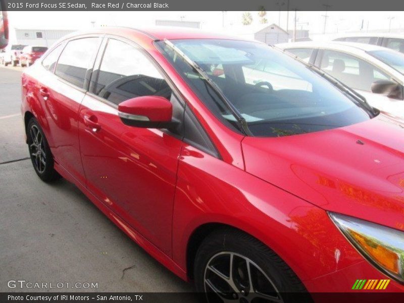 Race Red / Charcoal Black 2015 Ford Focus SE Sedan