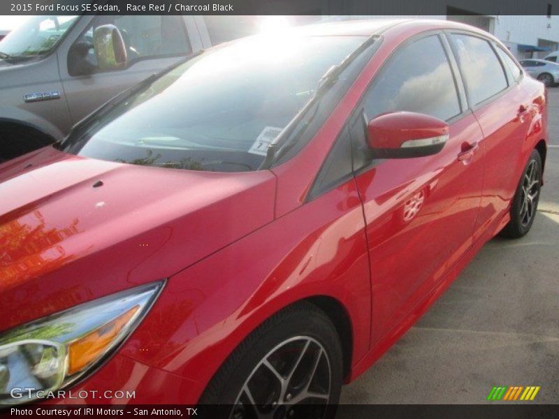 Race Red / Charcoal Black 2015 Ford Focus SE Sedan