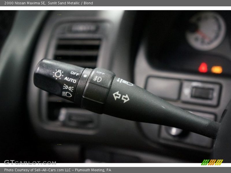 Sunlit Sand Metallic / Blond 2000 Nissan Maxima SE