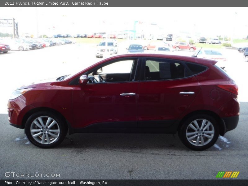 Garnet Red / Taupe 2012 Hyundai Tucson Limited AWD