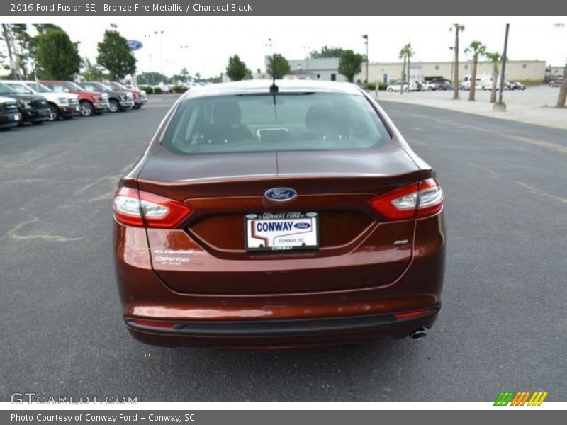 Bronze Fire Metallic / Charcoal Black 2016 Ford Fusion SE