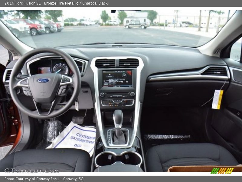 Bronze Fire Metallic / Charcoal Black 2016 Ford Fusion SE