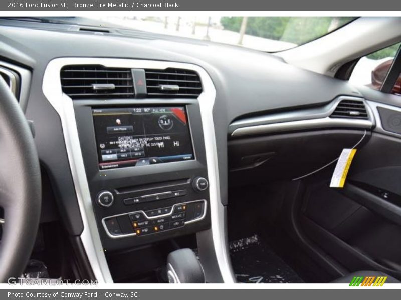 Bronze Fire Metallic / Charcoal Black 2016 Ford Fusion SE