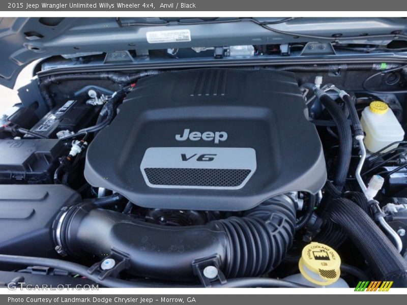 Anvil / Black 2015 Jeep Wrangler Unlimited Willys Wheeler 4x4