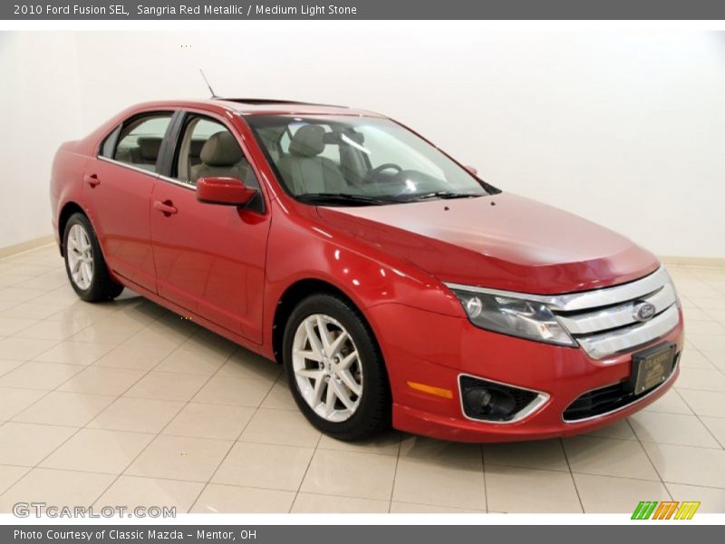 Sangria Red Metallic / Medium Light Stone 2010 Ford Fusion SEL
