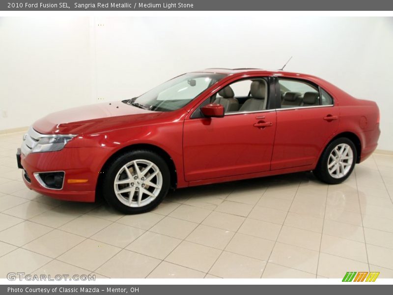 Sangria Red Metallic / Medium Light Stone 2010 Ford Fusion SEL