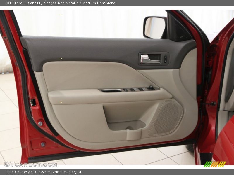 Sangria Red Metallic / Medium Light Stone 2010 Ford Fusion SEL