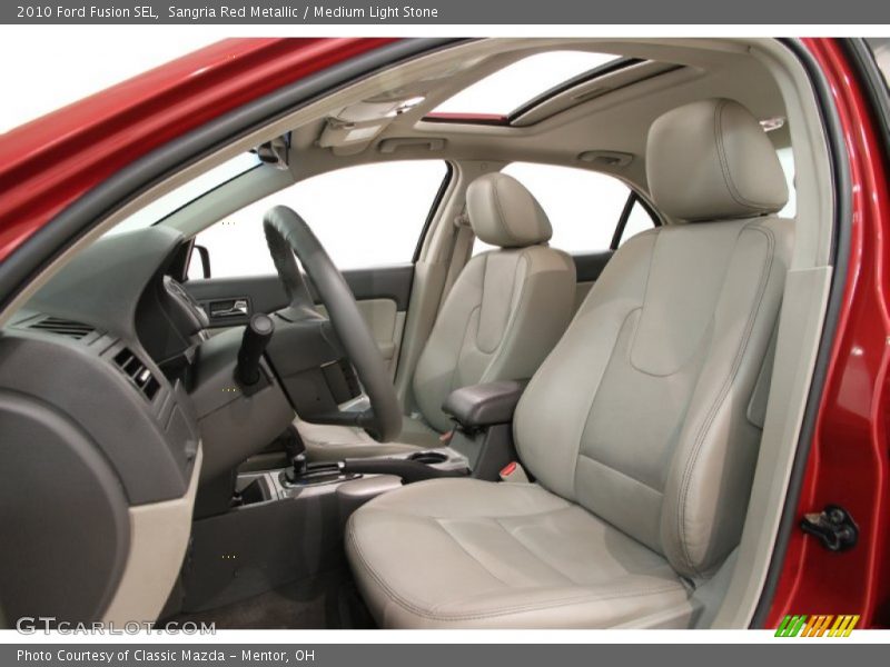Sangria Red Metallic / Medium Light Stone 2010 Ford Fusion SEL