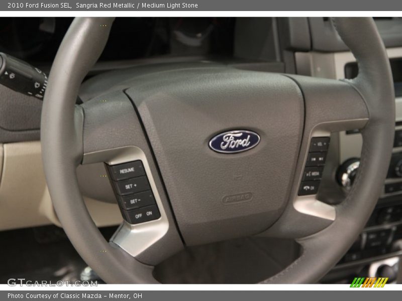 Sangria Red Metallic / Medium Light Stone 2010 Ford Fusion SEL