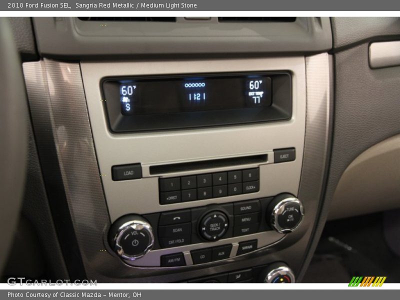 Sangria Red Metallic / Medium Light Stone 2010 Ford Fusion SEL