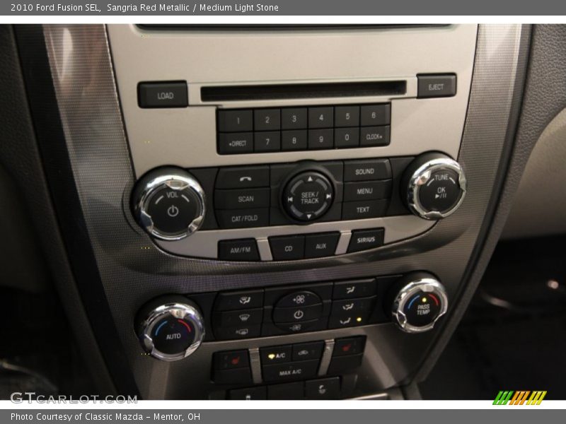 Sangria Red Metallic / Medium Light Stone 2010 Ford Fusion SEL
