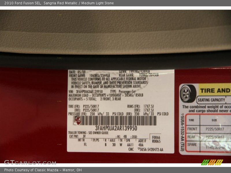 Sangria Red Metallic / Medium Light Stone 2010 Ford Fusion SEL